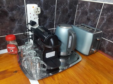 Kitchenette with coffee maker, kettle and toaster