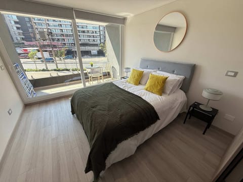 Relax in this cozy studio with a large window and balcony, perfect for enjoying city views and natural light.