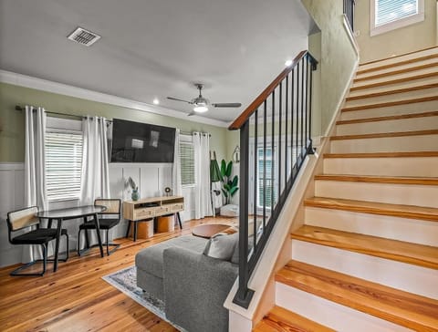 Stairs to bedroom and sunroom with trundle bed.