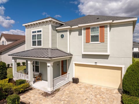 Bright and spacious home with charming covered porch