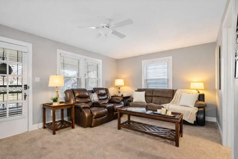 Living Area: Bright and cozy living room designed for comfort after a day exploring Louisville.