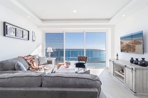 Condo, Multiple Beds, Balcony, Ocean View (Encantame Towers Velero 902) | Living area | 42-inch flat-screen TV with digital channels
