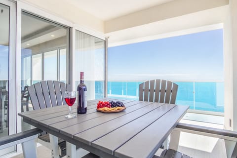 Condo, Multiple Beds, Balcony, Ocean View (Encantame Towers Velero 1801) | Outdoor dining