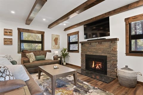 Comfortable living room with a cozy gas fire place.  