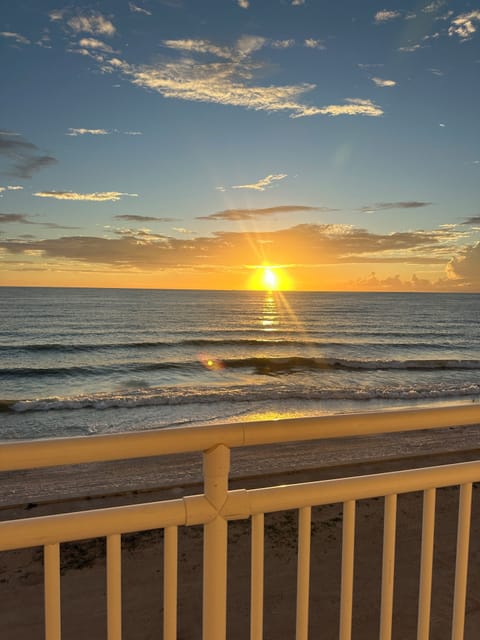 Sunset on balcony from chair. Direct Gulf views closest condo to Gulf on Gulf 