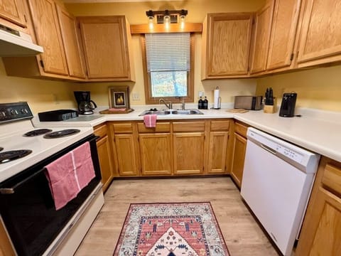 Kitchen equipped to prepare simple snacks or full family meals.