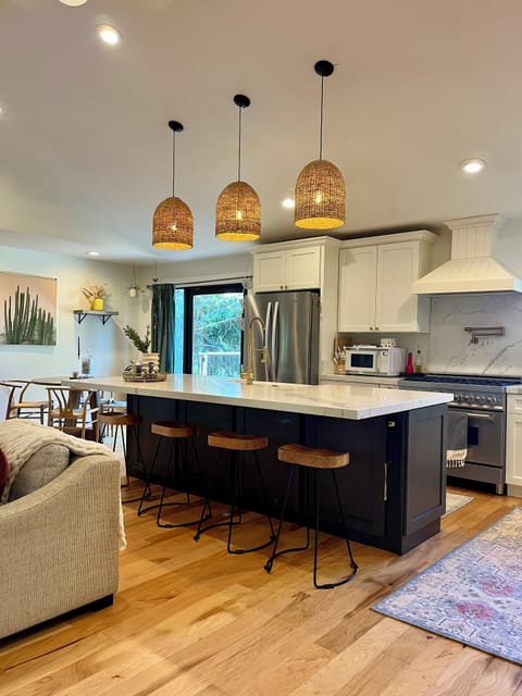 The open-concept kitchen and living room was created for the chef in you!