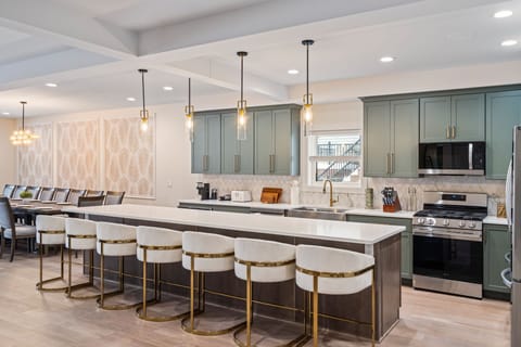 Chef's Dream: Open, fully equipped kitchen with stunning quartz countertops