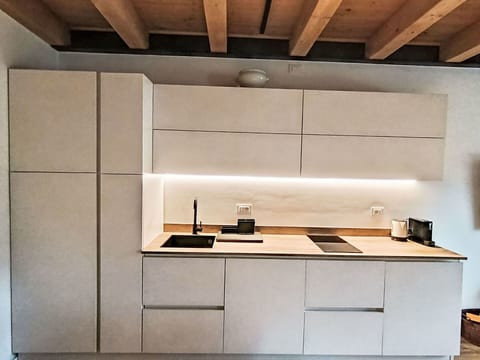 Flooring, Wood, Interior Design, Countertop, Kitchen, Furniture, Kitchen Appliance, Floor, Cabinetry, Home Appliance