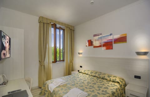 Double Room | Minibar, in-room safe, desk, cribs/infant beds