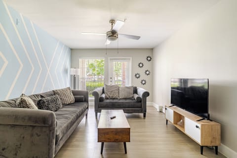 Bright modern living room with stylish seating and natural light