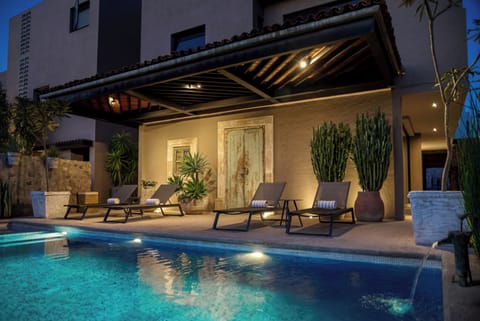 Outdoor pool, open 8:00 AM to 8:00 PM, free cabanas
