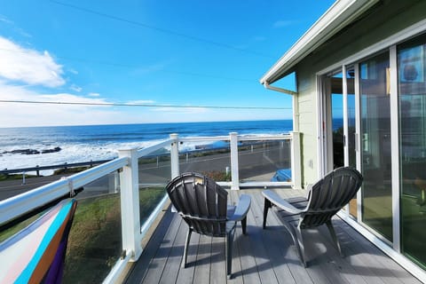 Enjoy the deck off of the living room and listen to the waves.