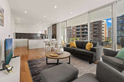 Bright open living space, open kitchen and large verandah.