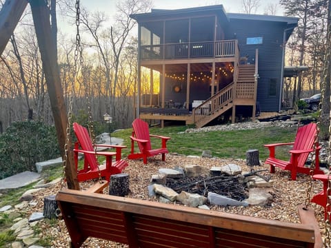 Firepit with chairs and swing. 