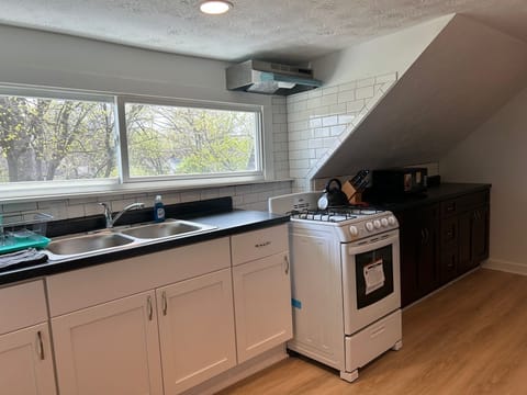 Across from the table, your sink and stove (stove is corrected..new pic coming)