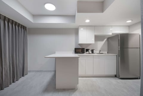 Suite, 1 King Bed with Sofa bed, Non Smoking | Premium bedding, desk, laptop workspace, blackout drapes