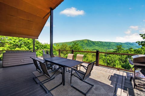 Enjoy the views from the spacious upper deck, complete with outdoor dining and gas grill.
