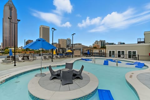 Resort-style rooftop pool with breathtaking panoramic Atlanta skyline views.