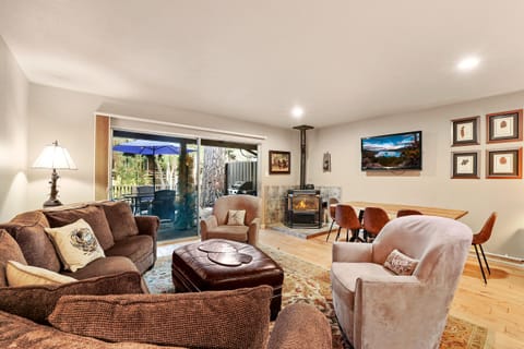 After a day outdoors, curl up on the couch and let the gentle warmth of the fire and quiet creek outside remind you—you’ve found your place to pause.
