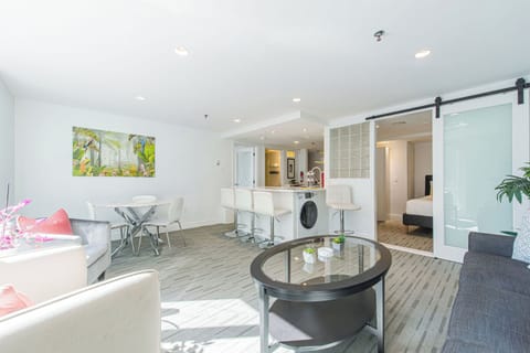 Bright open space living room over looking up and coming Dresden Row!