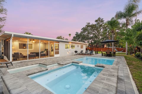 Equipped with a hot tub for soaking and relaxation.