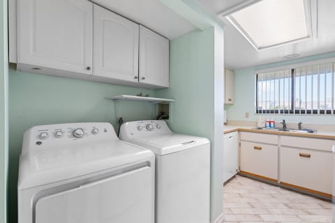 Enjoy the comforts of home with a washer and dryer ready for sandy towels and swimsuits. This beachside convenience keeps your coastal getaway fresh and carefree throughout your stay.