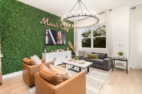 2nd Floor: Open concept living area with cozy seating and modern design that flows effortlessly into the open kitchen.