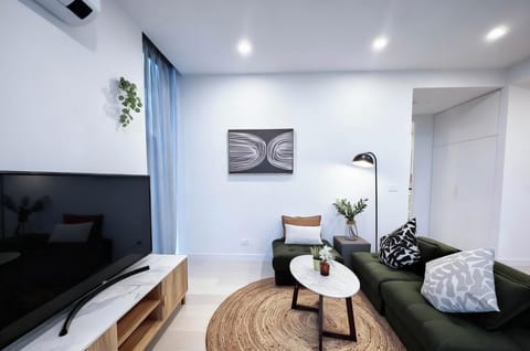 Comfortable sofa and TV