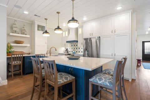 Gourmet Kitchen: Whip up delights in this beautifully designed space with ample seating!