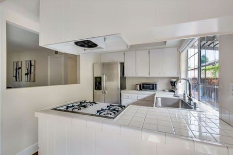 Fully equipped kitchen with stainless steel appliances and everything you need to cook your favorite meals.
