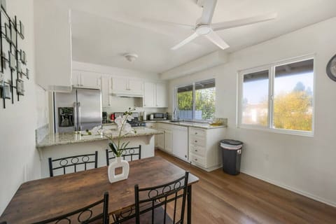 Bright kitchen with full amenities and dining space for shared meals