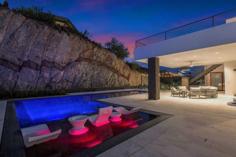 Immerse in vibrant waters, under a majestic sky.