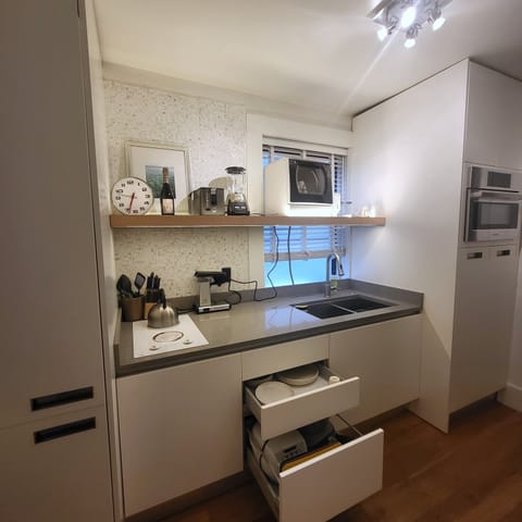 Fully equipped kitchen and laundry