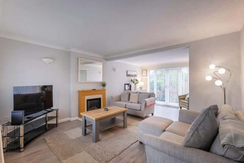 “Sunlit and spacious — a beautiful living room designed for comfort and connection.”