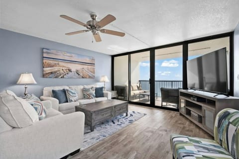 The ocean front living room is well-appointed with comfortable furnishings.