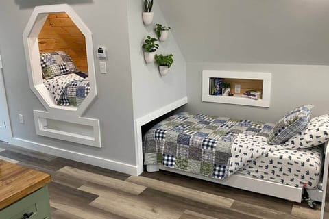Shown with trundle bed accessible. 