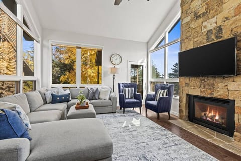 Mountain charm meets modern comfort in this 4-bedroom condo near all the action