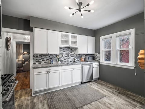 Bright, modern kitchen with sleek finishes and light