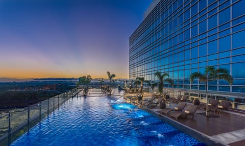 Outdoor pool, open 8:00 AM to 8:00 PM, sun loungers