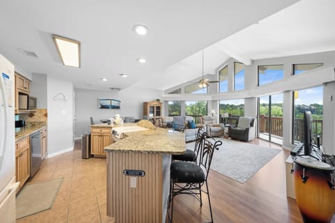 Signature Duplex, 4 Bedrooms, Kitchen, Bay View | Living room | 40-inch Smart TV with digital channels