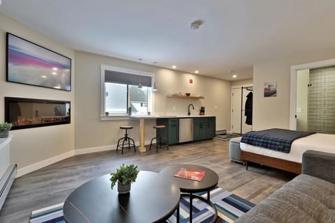 The cozy living area, built for relaxing after a day on the slopes in front of the fireplace.