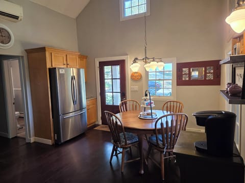 another angle of dining area and entrance door. 
