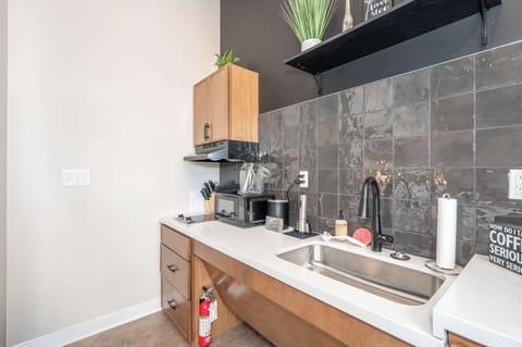 The sleek, open kitchen is well equipped for an unforgettable getaway