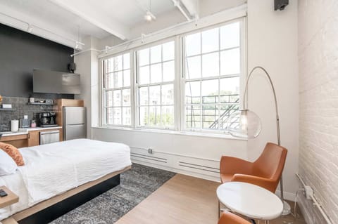 Recharge in this chic studio space after a day on the town