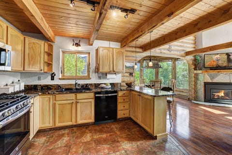 view from the kitchen into the dining room and great room