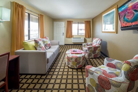 Double Queen Bed with Living Room Nonsmoking | Living area | 32-inch LCD TV with satellite channels, TV