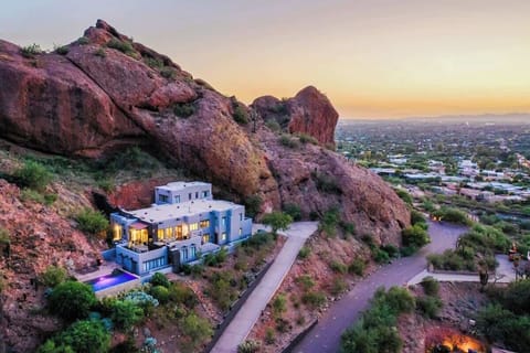 Set atop Camelback Mountain, this 5,579 sqft tri-level home offers the ultimate in privacy and panoramic views of all of Paradise Valley. A truly exceptional location.