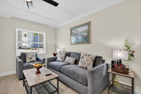 Bright & cozy living room w/ comfy seating, tasteful decor, and a relaxed vibe for unwinding after a full day.