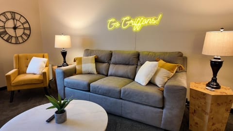 Cozy living room with stylish seating and warm lighting